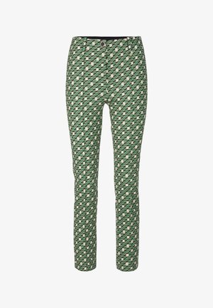 Pantalon vert coupe slim avec un motif géométrique diagonal en blanc et noir, doté d'une fermeture à bouton à la taille.