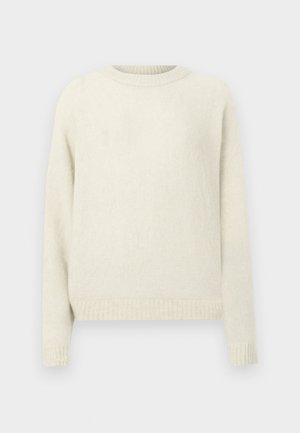 Heledbeez värvi kootud sviiter ümmarguse kaeluse, pikkade varrukate ja sooniku äärisega. Pehme tekstuur ja lihtne disain, sobib igapäevaseks kandmiseks.