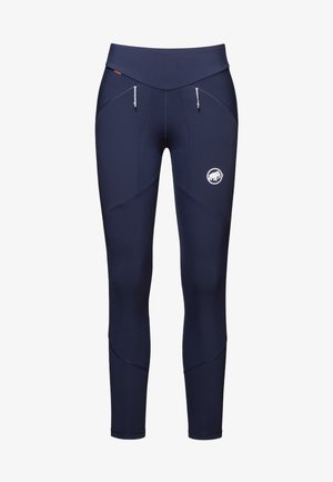 Leggings sportivi blu navy con vita alta, tasche con zip e logo sul polpaccio. Tessuto liscio ed elastico con dettagli delle cuciture.