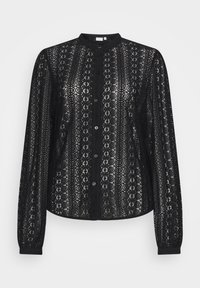 Blouse en dentelle noire avec un col haut, des manches longues et une fermeture à boutons, ornée d'un motif géométrique. Légère et transparente.