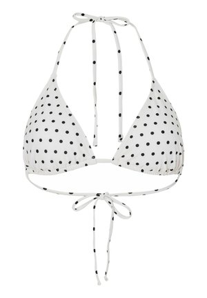 Haut de bikini triangle blanc à pois noirs, avec un col halter et des liens dans le dos avec des nœuds sur fond blanc.