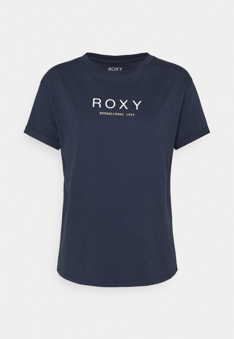 T-shirt à manches courtes bleu marine avec "ROXY" et "ESTABLISHED 1990" imprimés en blanc et jaune sur la poitrine.