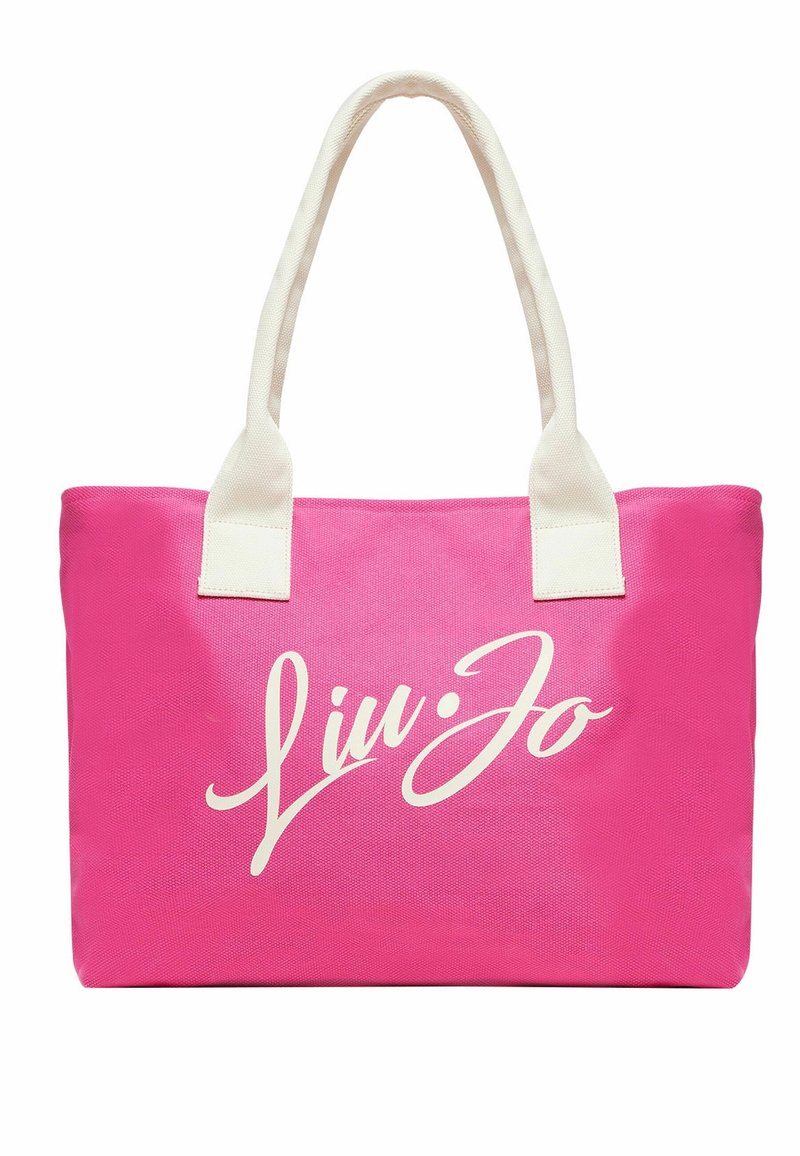 Różowa torba na ramię z płótna z białymi uchwytami i dużym białym logo "Liu Jo". Posiada teksturowaną powierzchnię i przestronny design.
