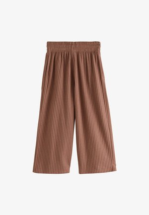 Pantaloni marroni a coste, a gamba larga, con elastico in vita e tasche laterali. Tessuto morbido, design fluido e lunghezza fino al polpaccio.
