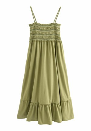 Robe vert sauge avec bretelles réglables, corsage smocké et ourlet fluide à volants ; confectionnée en tissu doux et léger.