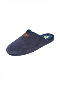 Zapatilla azul marino sin cordones con parte superior texturizada, forro de tela suave, suela de goma y un pequeño detalle de logo en cuero marrón.