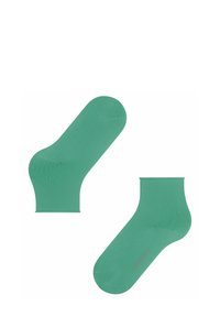 Hellgrüne Baumwoll-Crew-Socken mit glatter Textur, nahtloser Zeheneinfassung und dezenten Markierungen an der Ferse.