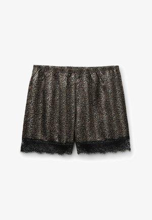 Shorts imprimé léopard avec une bordure en dentelle noire à l'ourlet. Confectionnés en tissu doux ; dotés d'une ceinture élastique pour le confort.