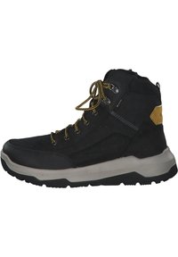 Zwarte suède wandelschoenen met grijze rubberen zool, gele accenten en metalen oogjes. Beschikt over een hoge enkel en een geperforeerd mesh paneel.