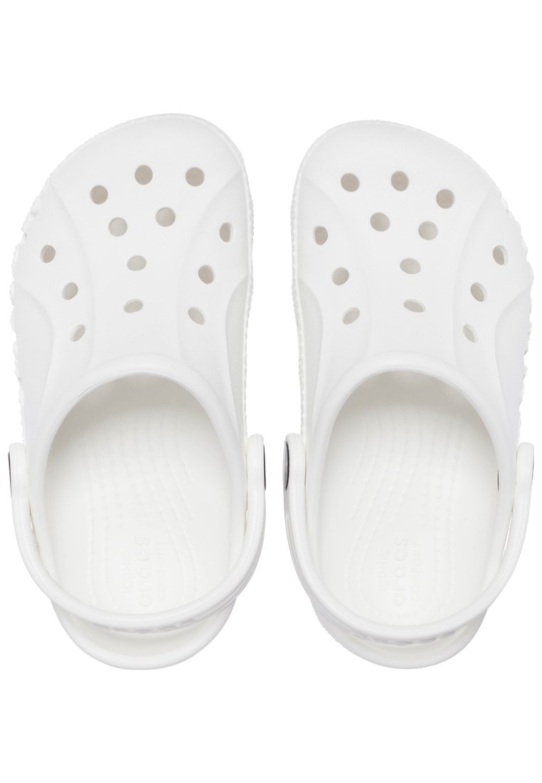 White clogs made of soft, durable material. Features ventilation holes and a heel strap for secure fit. Textured footbed for comfort.