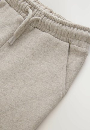 Helle graue Sweatpants aus einem weichen Baumwollmischgewebe, mit einem elastischen Bund und Kordelzug sowie seitlichen Taschen.