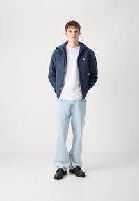 Calvin Klein Jeans PADDED HOODED HARRINGTON - Lahka jakna - ink