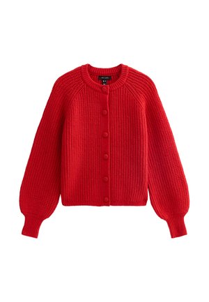 Cardigan rosso lavorato a maglia con scollatura rotonda, chiusura a bottoni e maniche a palloncino. Coste testurizzate lungo tutto il capo e lunghezza cropped.