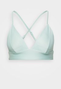 Top de bikini de ribetes verde claro com um design triangular, apresentando alças ajustáveis em cruz e uma faixa larga na base.