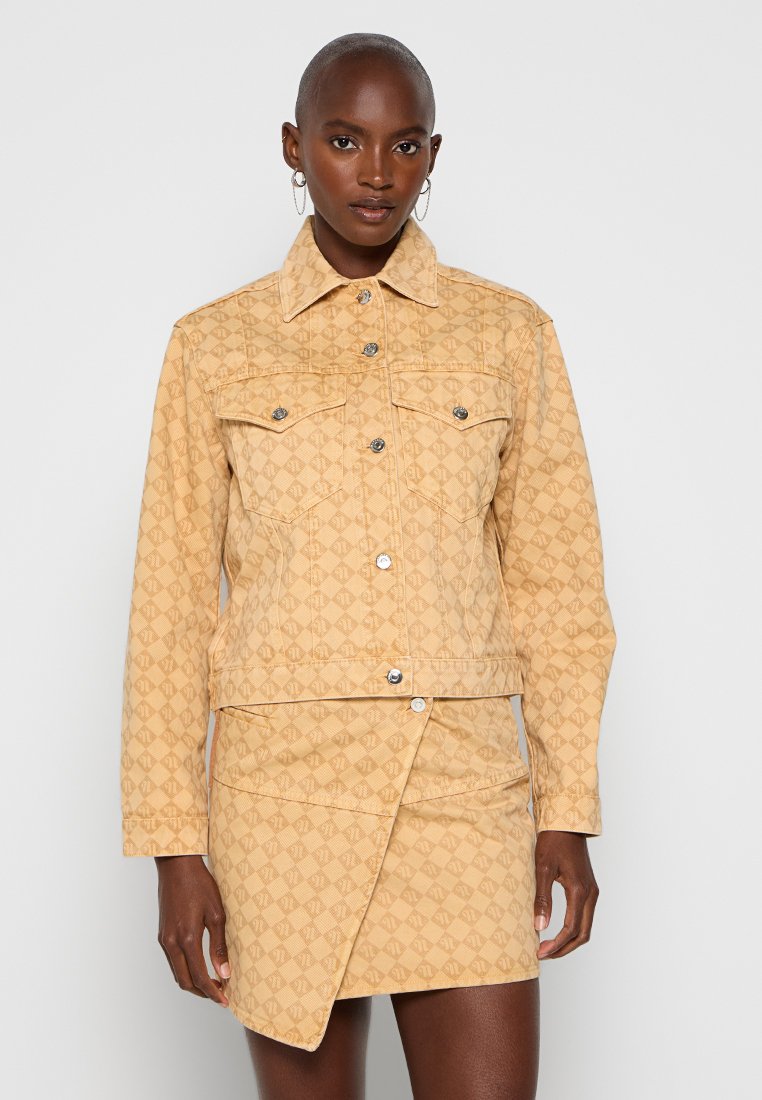 Nanushka Spijkerjas geel