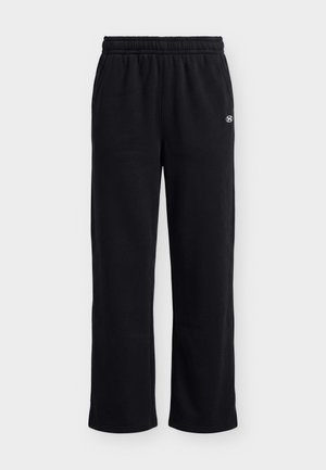 Under Armour, RIVAL FLEECE - Pantalon de survêtement - ultimate black/white
