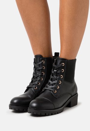 Lace-up ankle boots - black