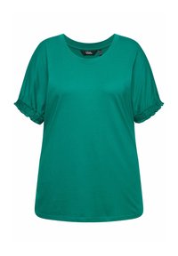 Camiseta de algodón verde con mangas cortas y rizadas y un escote redondo. Textura suave, corte relajado y sin gráficos ni patrones visibles.