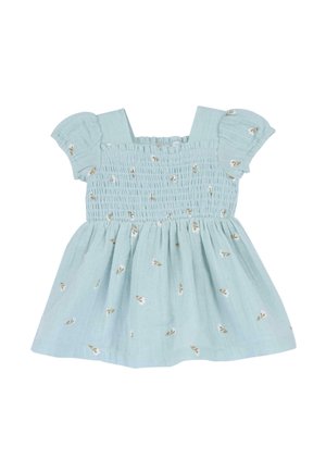 Robe bleu clair en coton, avec un corsage smocké, des manches bouffantes courtes et de petits motifs floraux bruns. Design de jupe évasée.