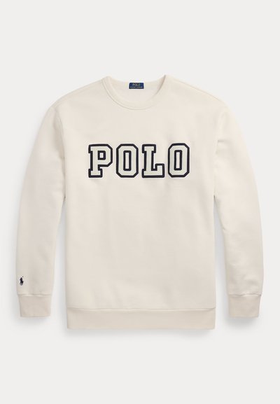 Kremna dukserica iz bombaža, na sprednji strani s bold napisom "POLO" v mornarsko modri barvi, z majhnim mornarsko modrim logotipom na levem rokavu.