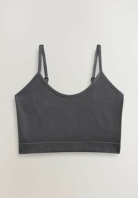 Sivi rebrasti bralette s podesivim trakama i širokim elastičnim pojasom na dnu. Mekana tekstura, bezšavni dizajn i zaobljen dekolte.
