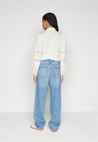 ONLY ONLHARLEY BAGGY LOOSE - Széles szárú - light blue denim