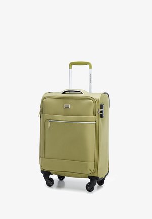 Valise rigide de couleur vert clair, avec une surface texturée, deux roues et une poignée en métal argenté avec un mécanisme de verrouillage.