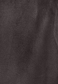 Dark gray suede fabric with a soft, textured surface, featuring a subtle sheen and varying tones throughout, ideal for upholstery or accessories.