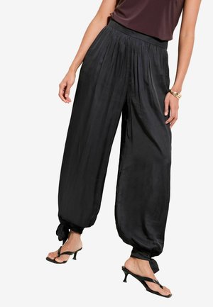 TIE BALLOON - Nadrágok - black