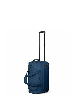 Blue soft-sided rolling suitcase with extended black telescopic handle and multiple carrying straps on a white background.