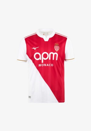 Rood-wit AS Monaco voetbalshirt met diagonale splitsing, clubembleem, "apm MONACO" logo en wit met gouden rand afgewerkte mouwen.