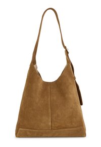 Sac hobo en daim marron clair avec une forme souple, une bandoulière unique et un pompon décoratif sur le côté. Texture lisse avec des coutures minimales.