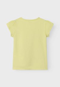 Żółta bawełniana koszulka z krótkimi bufkami, okrągłym dekoltem i gładkim wzorem, charakteryzująca się gładką fakturą i regularnym krojem.