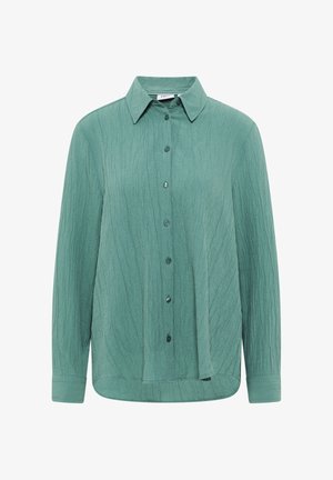 Green, long-sleeve button-up shirt with a textured fabric, collar, and six buttons down the front, featuring a curved hem and relaxed fit.