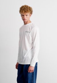 Ellesse QUINZANO - Hosszú ujjú felső - white