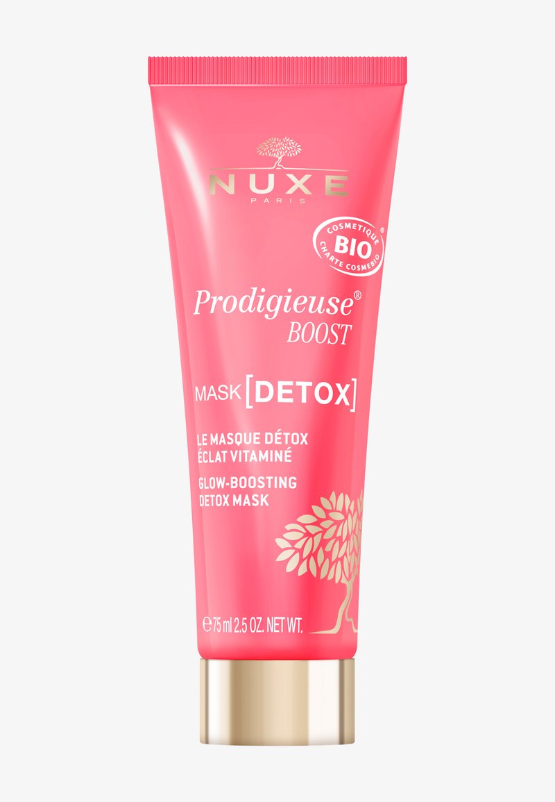 Tubetto rosa con accenti dorati, caratterizzato dal marchio "NUXE". Il testo include "Prodigieuse BOOST" e "MASK[DETOX]" in caratteri bianchi. Dimensione 75 ml.