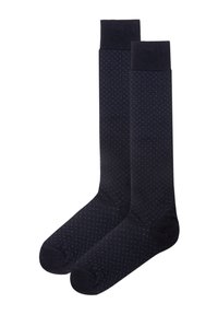 Calcetines azul marino con un sutil patrón de espiga, material de mezcla de algodón, puños acanalados y punteras reforzadas para mayor durabilidad.