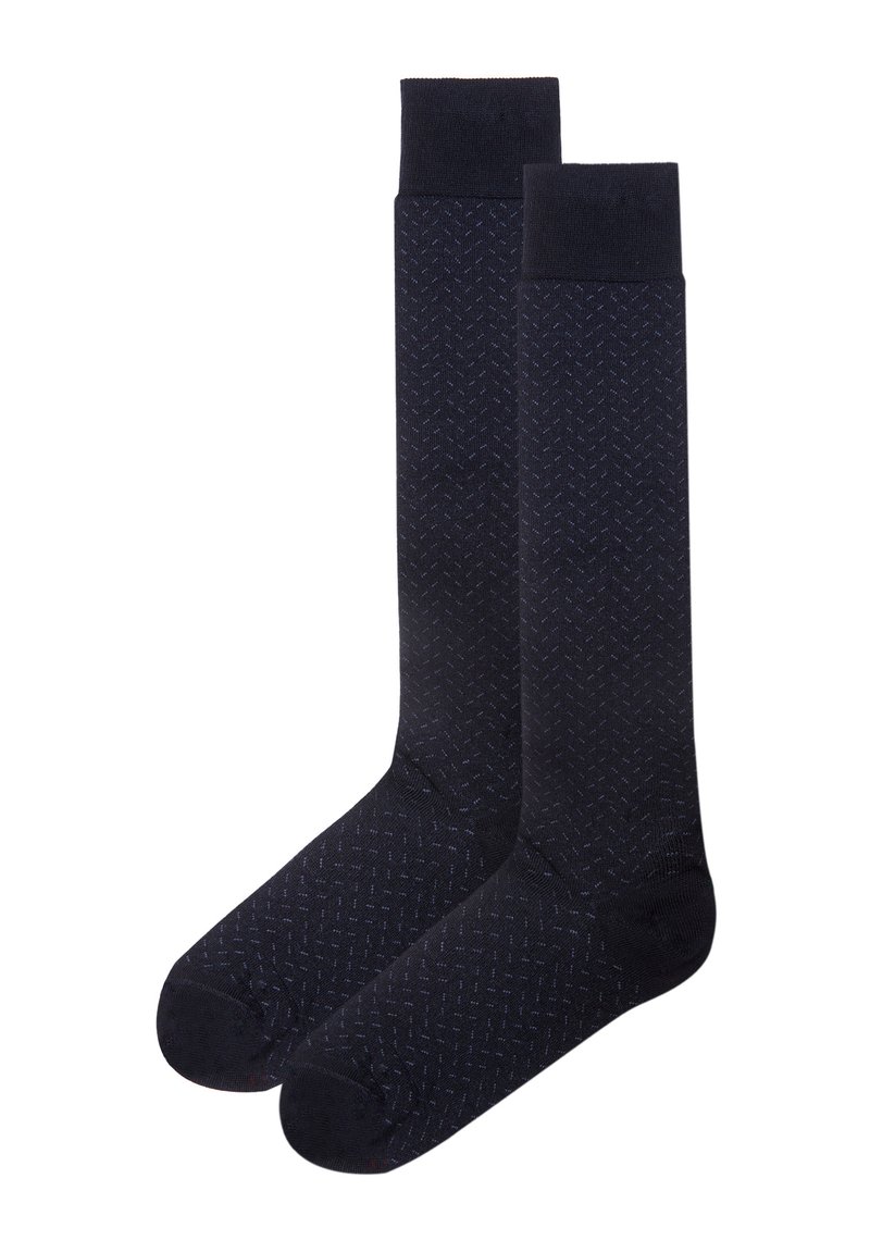 Calcetines azul marino con un sutil patrón de espiga, material de mezcla de algodón, puños acanalados y punteras reforzadas para mayor durabilidad.