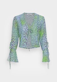 Sheer, cropped blouse with a v-neck and tie closure, featuring a green and blue spotted pattern. Flared sleeves with tie details.