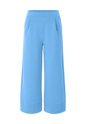 Light blue culottes made of soft fabric, featuring a wide-leg design, flat waistband, and cuffed hems with side pleats.