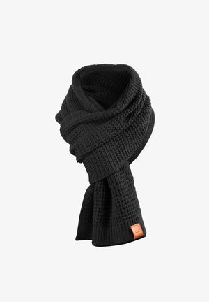Black knitted scarf with textured pattern, wrapped in a loop, featuring a small brown leather label on one end.