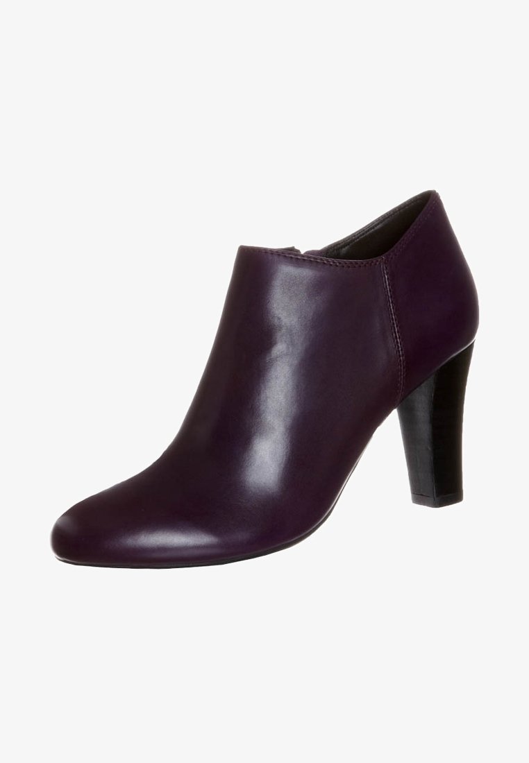 Bottine en cuir violet foncé à bout arrondi avec talon haut noir empilé, modèle sans lacets.