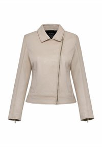 Jasnobeżowa skórzana kurtka z wysuniętym kołnierzem, asymetrycznym zapięciem na zamek oraz bocznymi kieszeniami. Posiada akcenty szwów oraz mankiety zapinane na zamek.