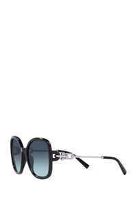 Occhiali da sole neri oversize con lenti sfumate, montatura in plastica lucida, dettagli in metallo argentato e estremità delle tempie nere.