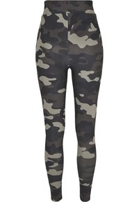 Camo leggings featuring a high waistband, made of smooth stretch fabric in shades of black, gray, and olive, with a patterned finish.