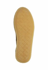 Suela de goma con un patrón de panal texturizado, con un borde marrón sólido y un centro amarillo claro y suave.