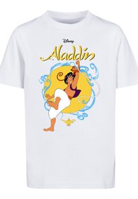 Hvit bomulls t-skjorte med et fargerikt grafisk bilde av Aladdin, med en gyllen sirkelbakgrunn, blå svungne linjer og en lampe nederst.