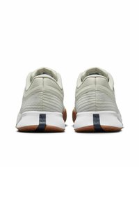 Light gray athletic shoes with a textured knit upper, contrasting white midsole, and rubber outsole. Features a back pull-tab and minimal branding.