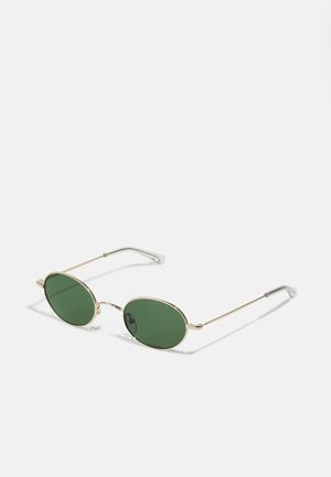Gold-framed sunglasses with green oval lenses and thin metal arms. Features clear plastic tips on the arms for comfort.