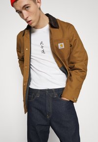 Carhartt WIP PONTIAC PANT MAITLAND - Tiesaus kirpimo džinsai - blue one wash